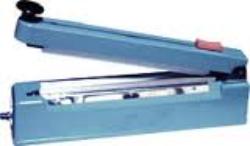 Bag sealer with cutter blade